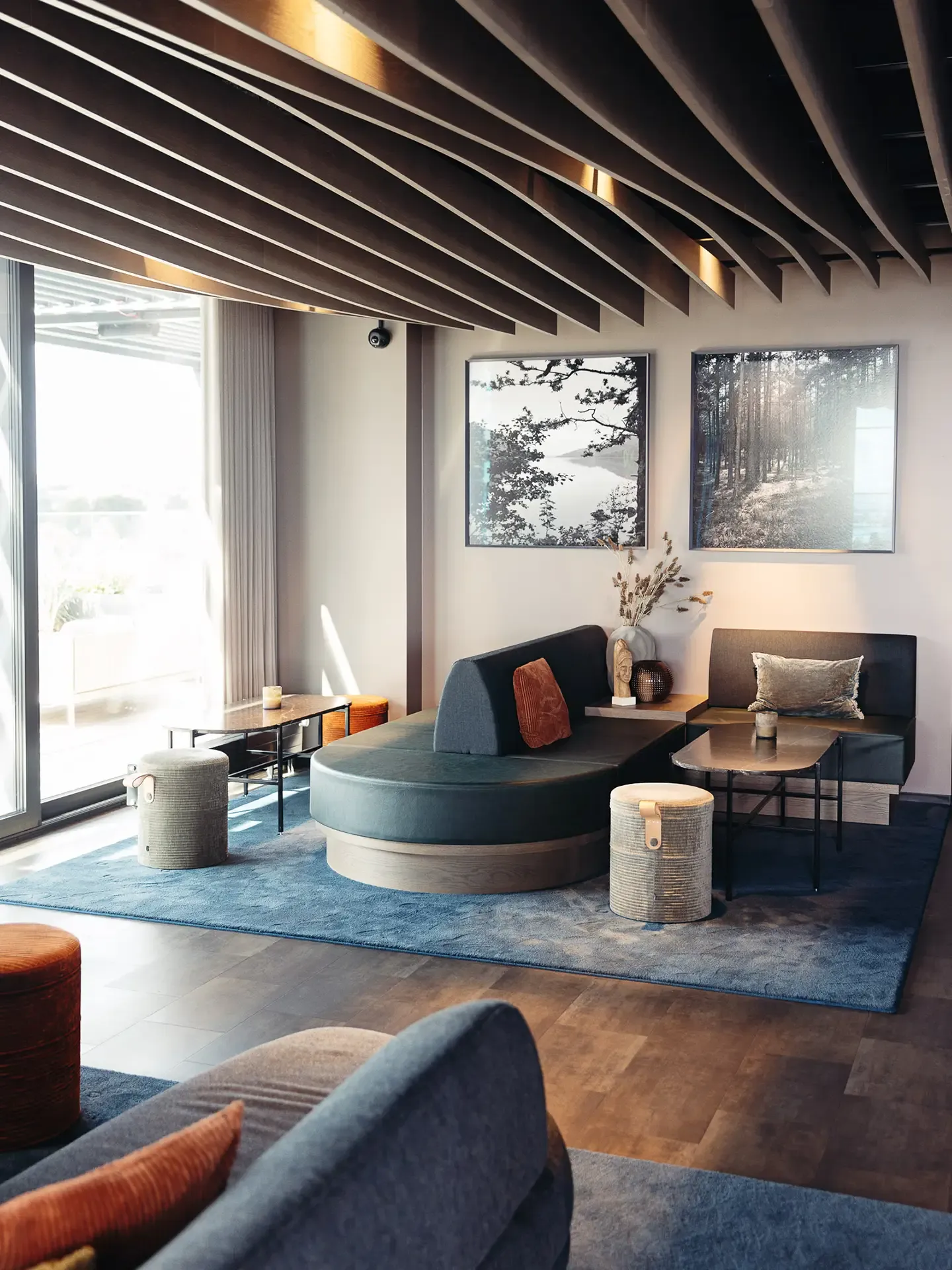 Bespoke lounge furniture for Den Fede Drue wine bar — zoned seating concept combining comfort, material contrast and hospitality ambience.