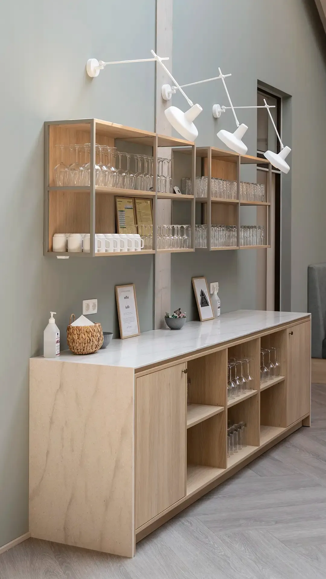 Breakfast area waiter station and shelving in hotel dining space. Custome-made by interior design firm Third.space.