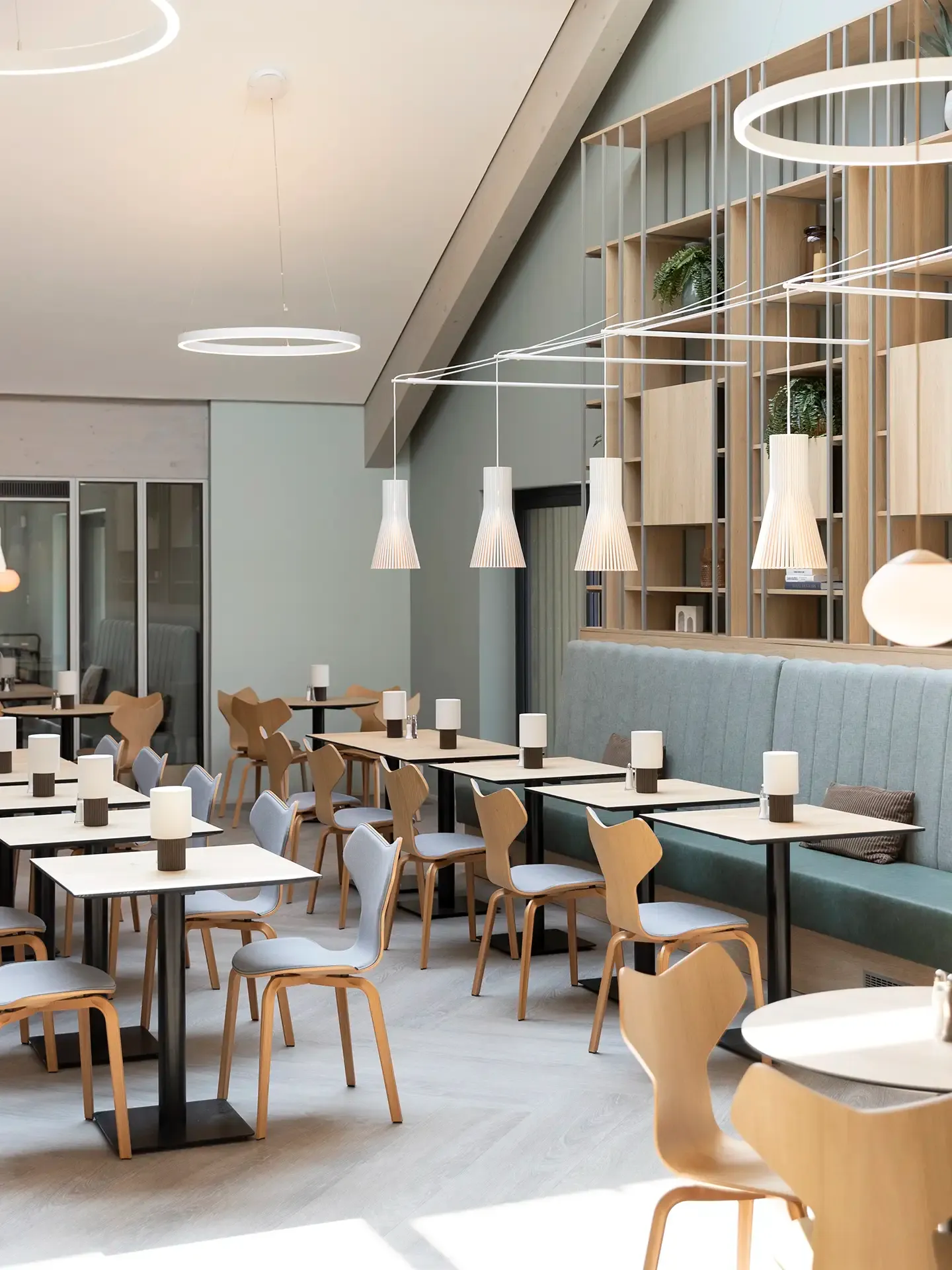 Scandinavian design breakfast restaurant in a hotel. Made by Third.space Interior firm.