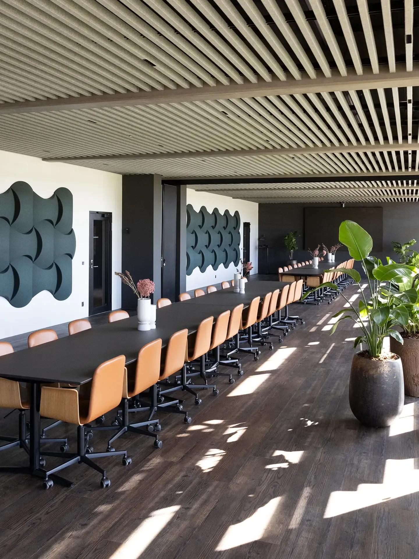 Modern conference facilities with long table, leather chairs, and Nordic design by Third.space.