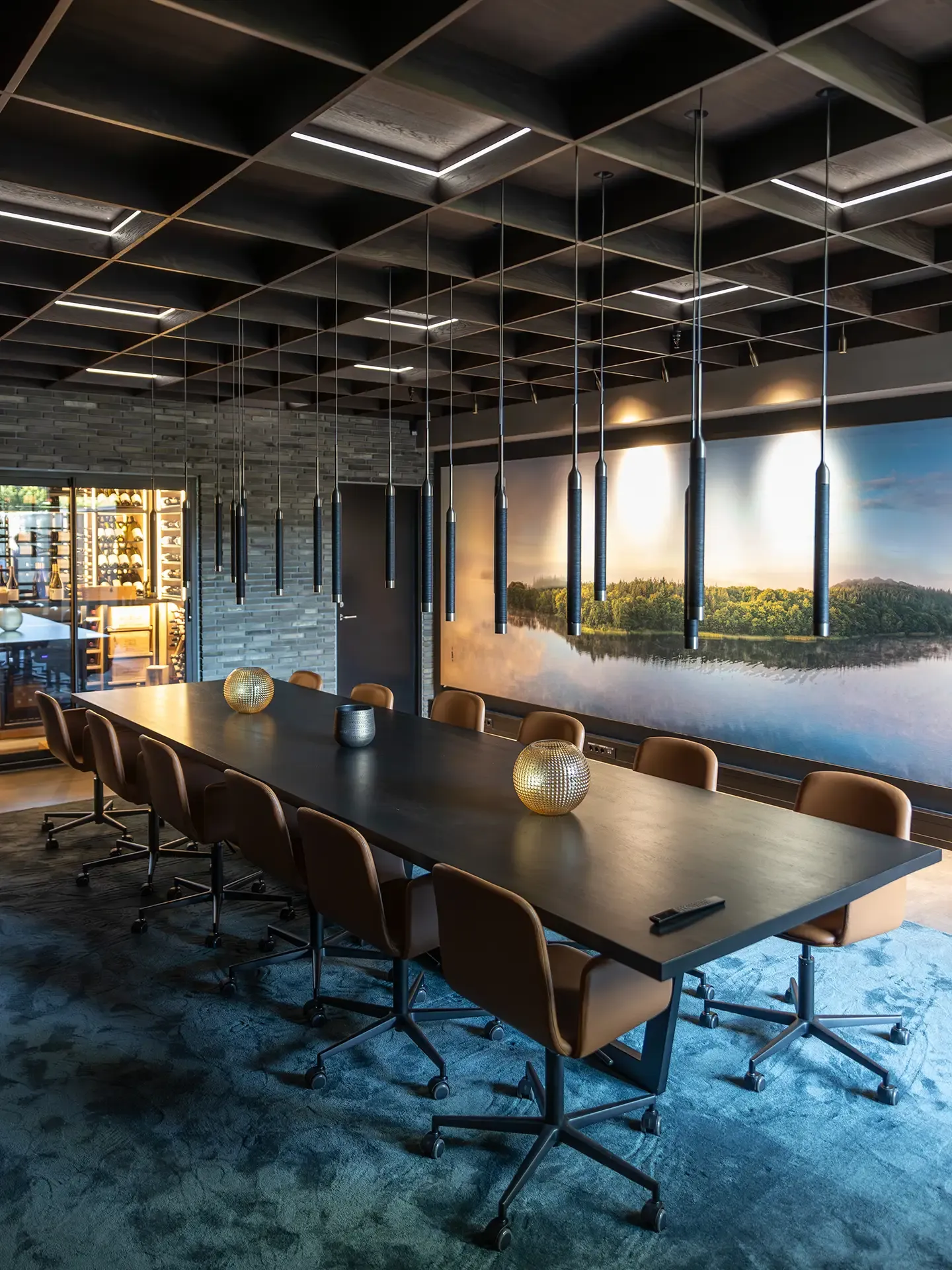 Modern meeting room interior design with dark wooden furniture and exclusive light setting.