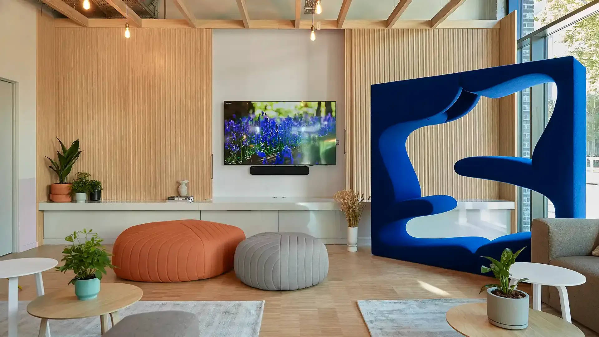 Student living communial area with custom made tv furniture and Verned Panton Living tower