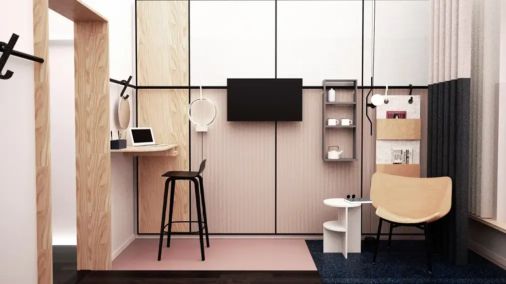 DGI Byens Copenhagen hotel room with custom-made furniture and elegant wall panels designed for functional aesthetics.