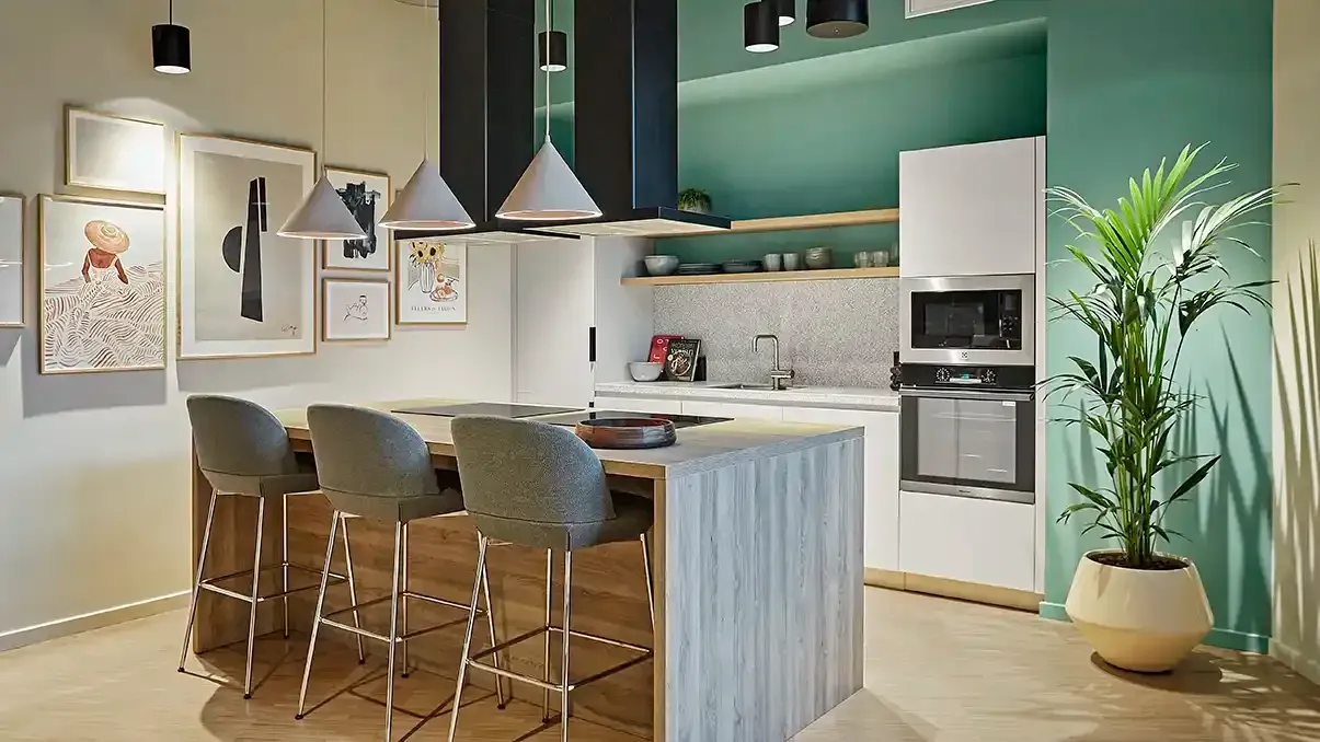 Modern communal kitchen with bar seating at student living in Copenhagen Denmark