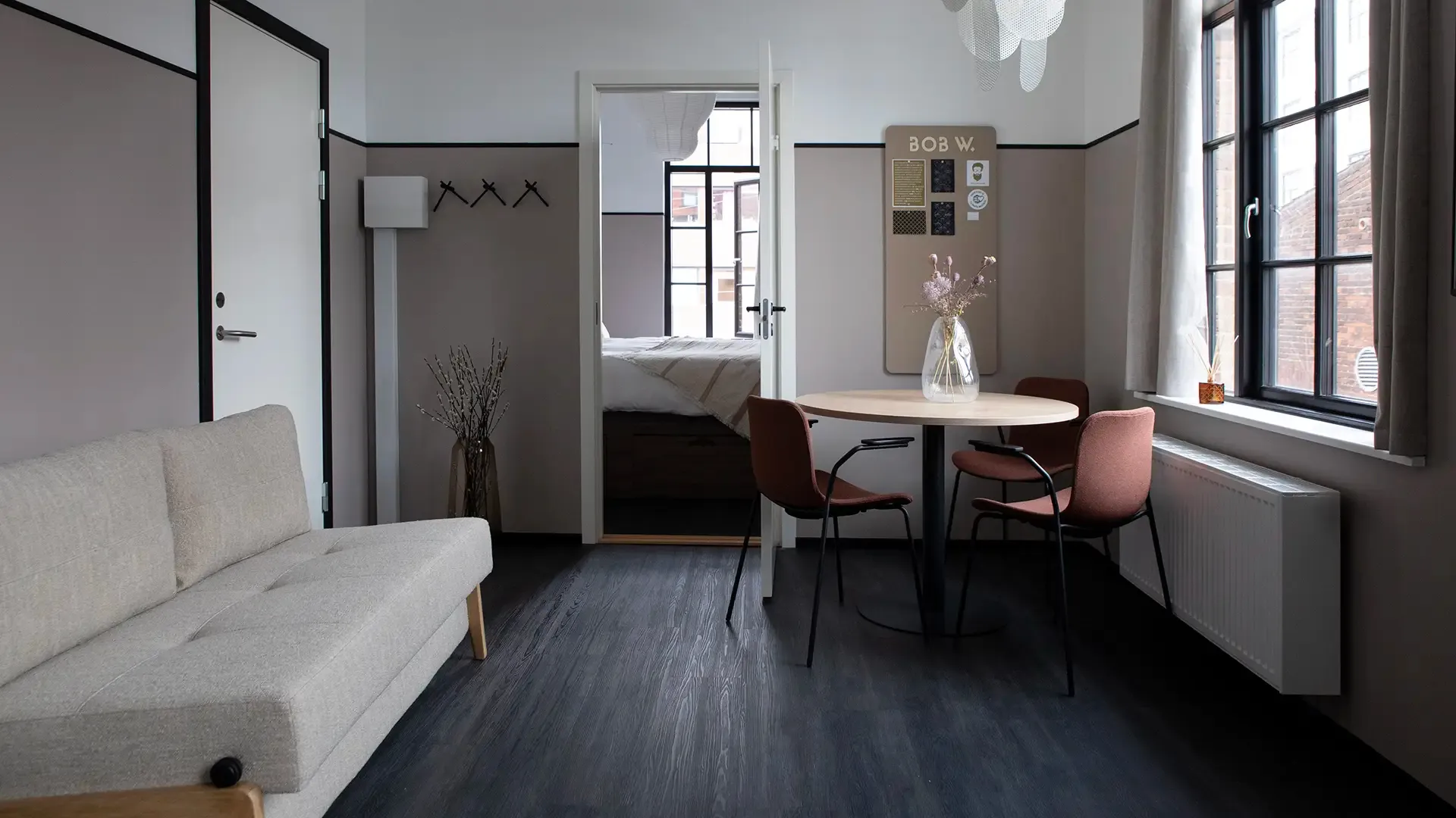 Short-stay apartment with Scandinavian living space, delivering functional, guest-friendly design for hospitality environments.