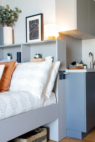 Student living custom made bed with storage and kitchenette. Scandinavian design.
